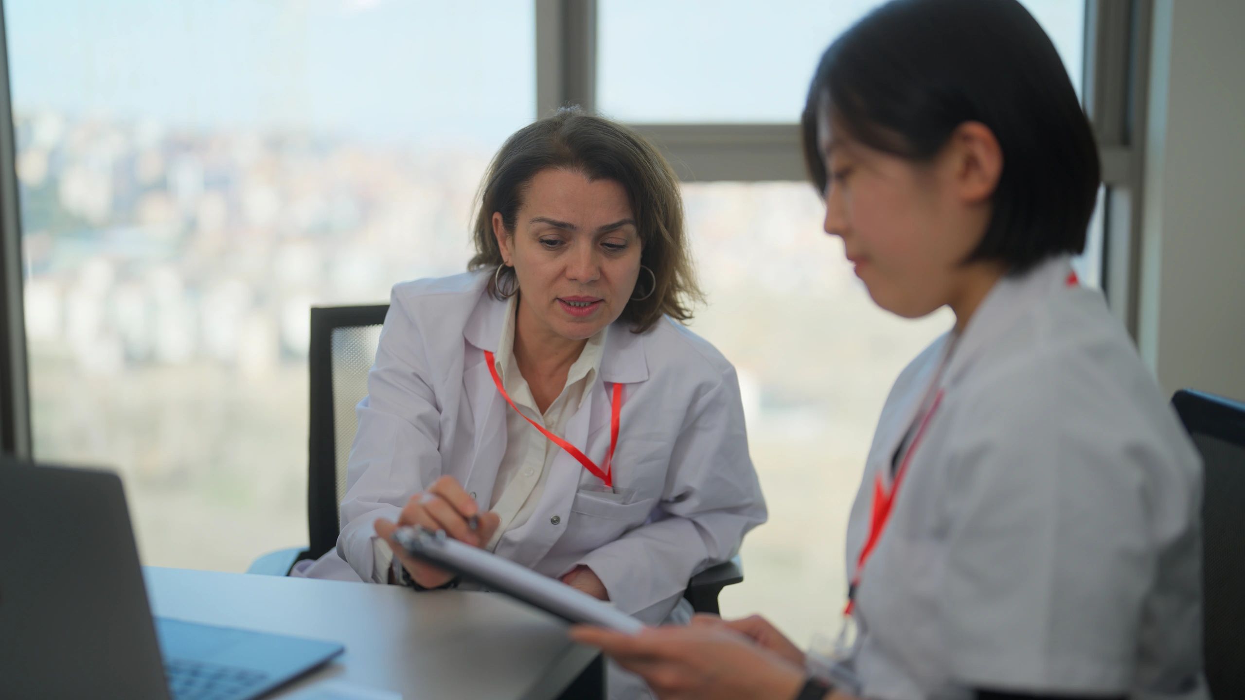 Clinical research professionals collaborating on budget planning