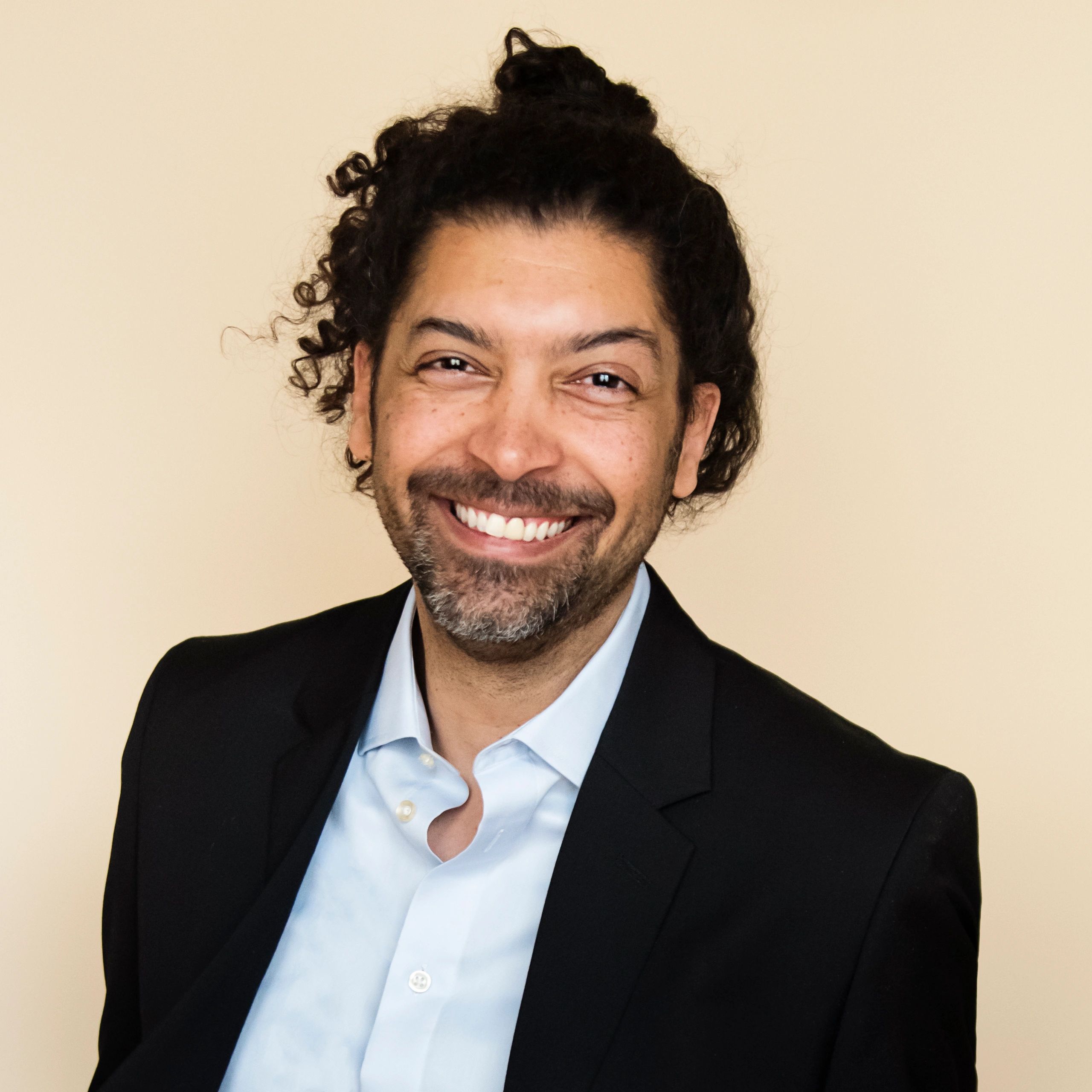 Professional headshot representing a clinical operations manager